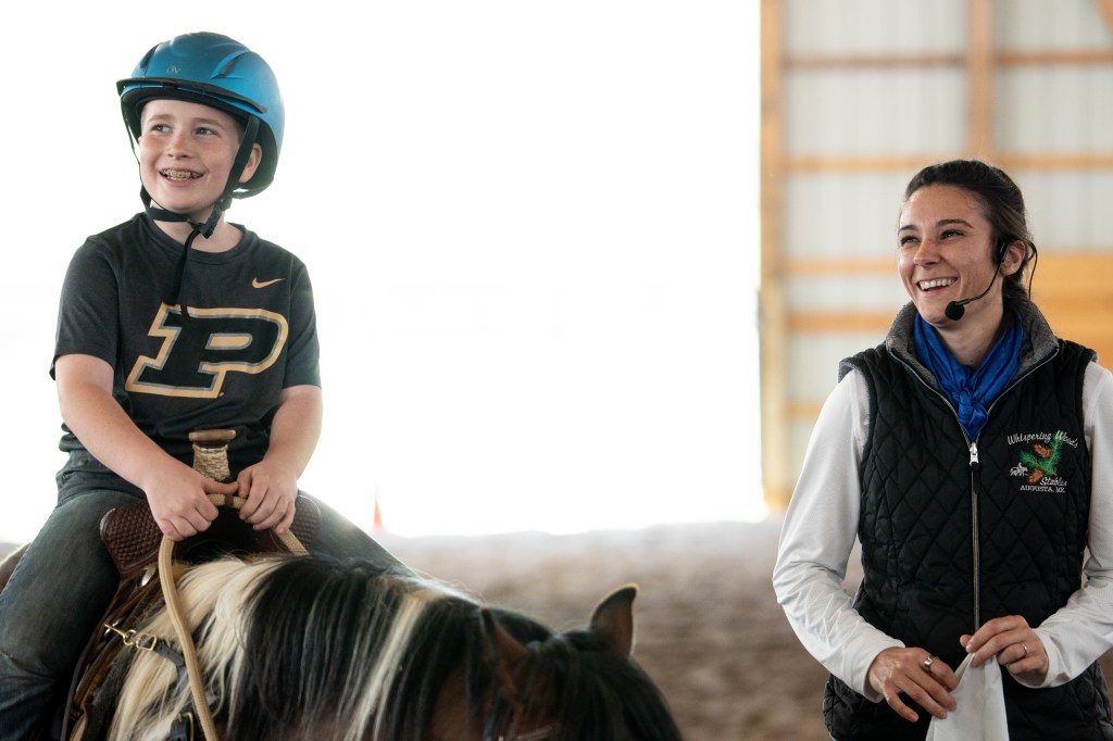 Jodi Powel with young student